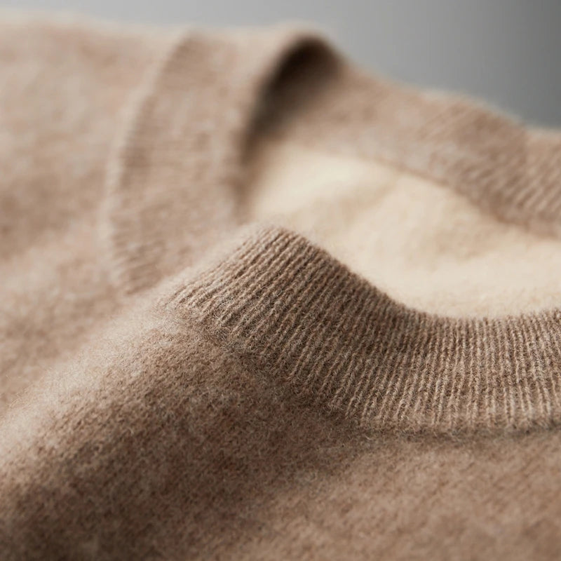 Crew neck detail of men’s double-knit cashmere sweater in Beigewood, finished in elastic 1×1 ribbing — From Borcelleclothes.