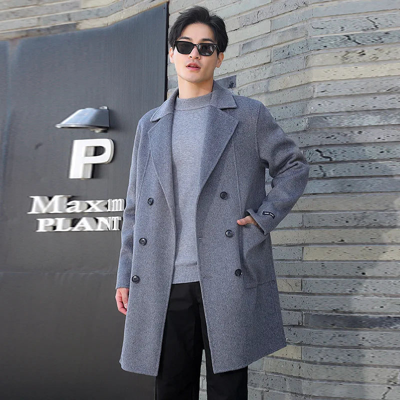 Men’s Double-Sided Wool Coat in Comet—crafted from 100% wool with a structured, double-breasted silhouette. Featuring six buttons, notch lapels, patch pockets, and a clean, unlined interior for lightweight warmth and everyday confidence. From Borcelleclothes.