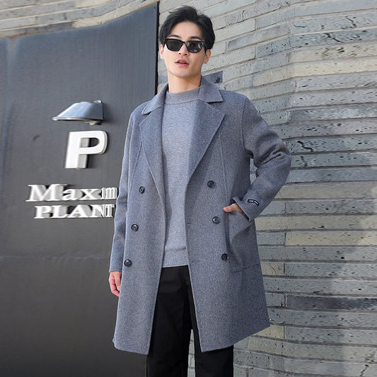 Men’s Double-Sided Wool Coat in Comet—crafted from 100% wool with a structured, double-breasted silhouette. Featuring six buttons, notch lapels, patch pockets, and a clean, unlined interior for lightweight warmth and everyday confidence. From Borcelleclothes.