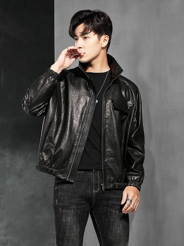 Men’s Dune cowhide leather jacket — model touching lips; zip-through stand collar visible. From Borcelleclothes.