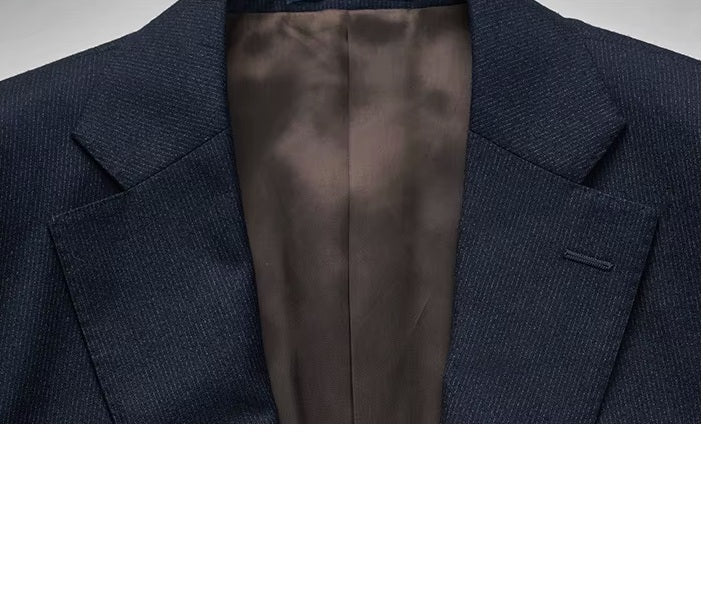 The notch lapels on the Borcelleclothes Men's Ebony Clay 3-Piece Suit blazer, showcasing the precision of the tailoring and fabric texture.