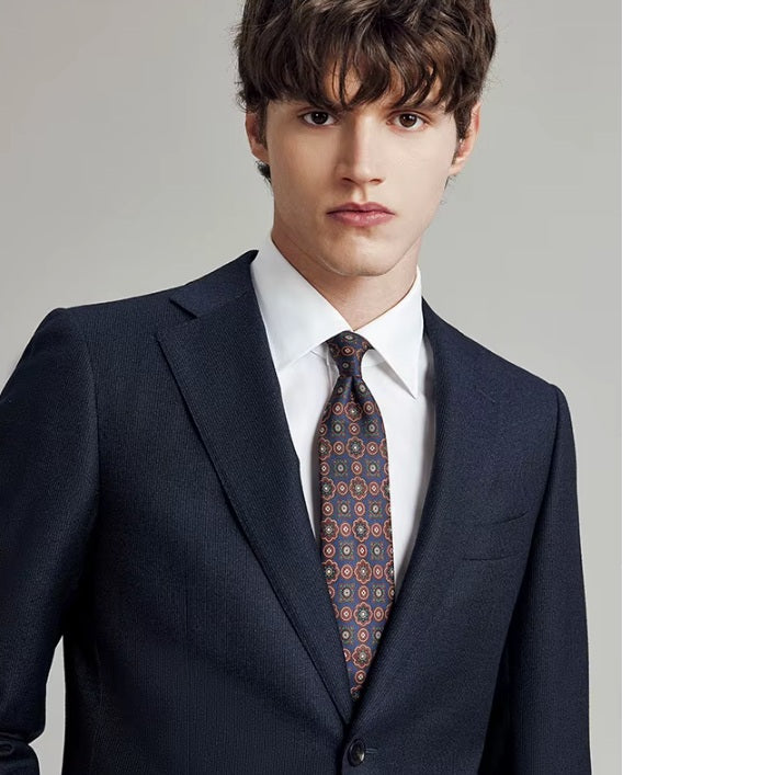 The upper part of the Borcelleclothes Men's Ebony Clay 3-Piece Suit, focusing on the notch lapels and single-breasted blazer design.
