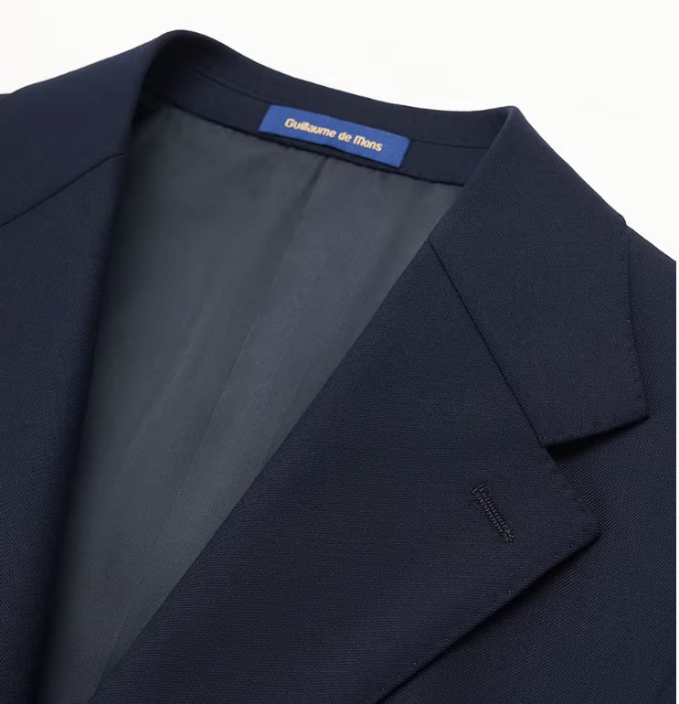 The blazer collar on the Borcelleclothes Men's Ebony Clay Business Suit, highlighting the precise tailoring and notch lapel design.