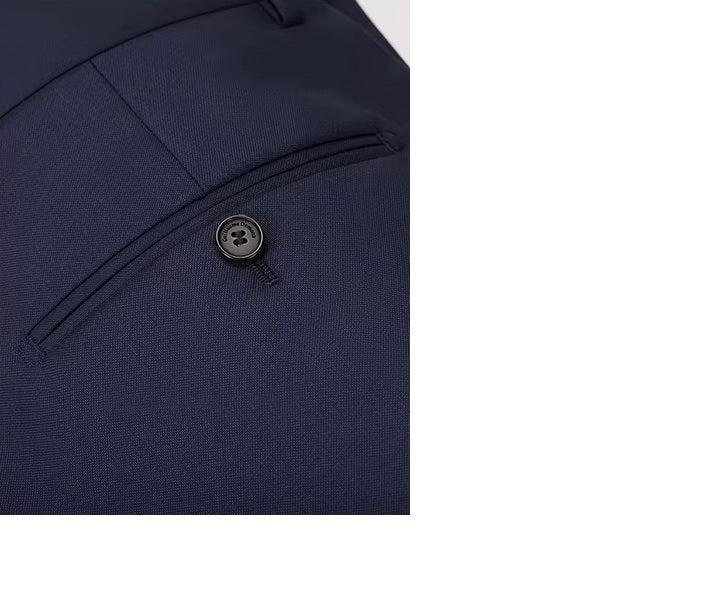 The back double-welt pocket on the pants of the Borcelleclothes Men's Ebony Clay Suit with Bold Brass Accents, balancing practicality with clean design.