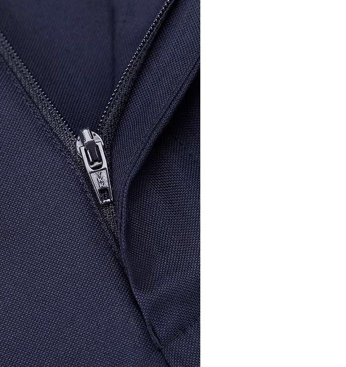 The zipper fly on the pants of the Borcelleclothes Men's Ebony Clay Suit with Bold Brass Accents, highlighting the meticulous craftsmanship.