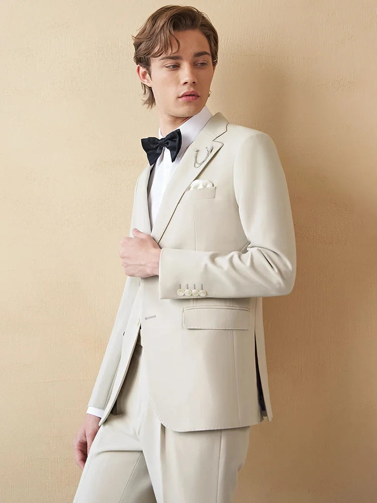 Model in the Borcelleclothes Men's Ecru White Suit, with one arm bent, highlighting the clean lines and sharp tailoring of the blazer.