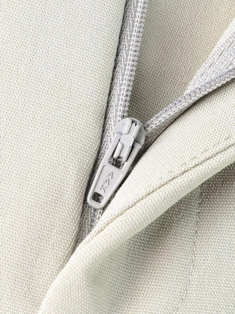 The zipper fly on the pants of the Borcelleclothes Men's Ecru White Suit, showcasing quality craftsmanship.