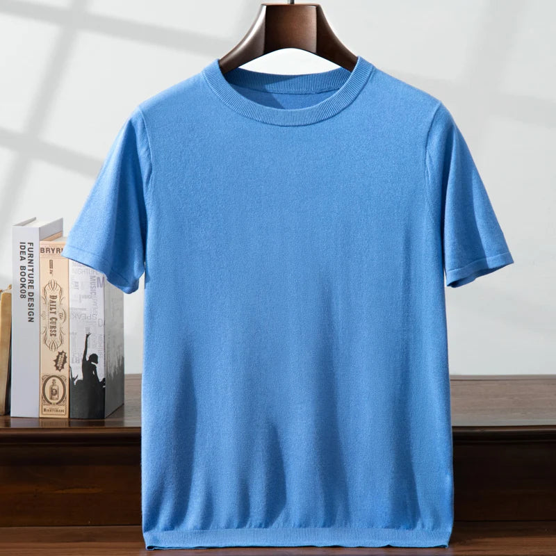 Men’s fine-knit silk-cashmere T-shirt in Cool Blue — lightweight and breathable knit with a smooth surface, ribbed neckband, and bottom hem. From Borcelleclothes.
