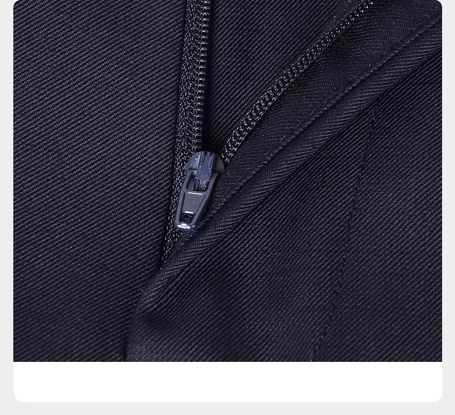 Ebony Clay trousers with zipper fly partially opened — tailored function with quiet form. From Borcelleclothes.