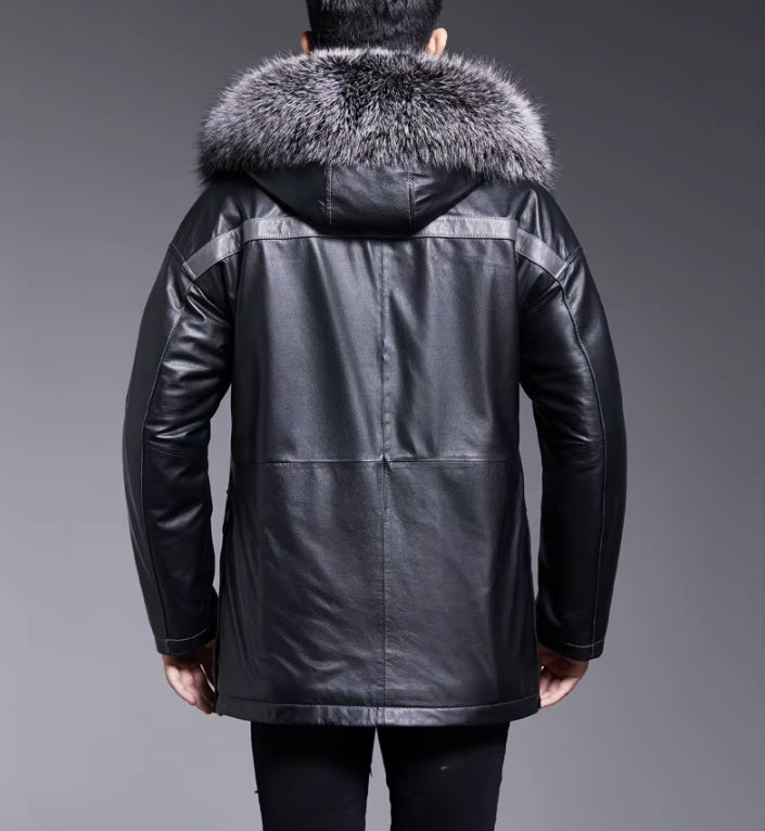 Back view of Onyx cowhide leather jacket with Shuttle Grey upper-back stripe and hood detail. From Borcelleclothes.