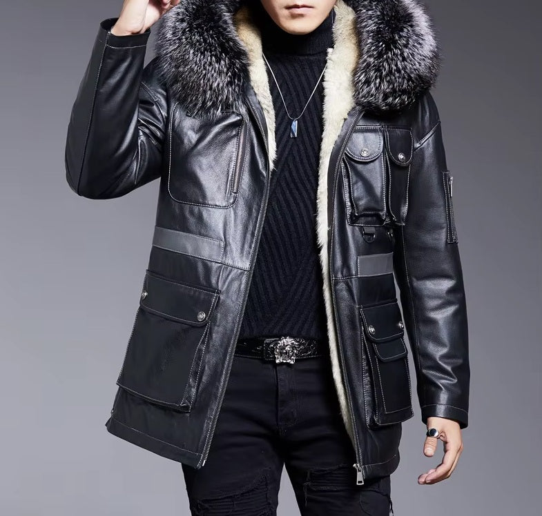 Model with one arm raised in Onyx leather jacket, revealing volume, sleeve structure, and flexibility of fit. From Borcelleclothes.