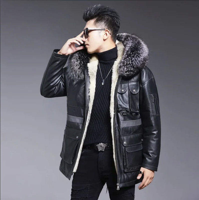 Model wearing Onyx cowhide jacket, touching glasses with one hand, highlighting shoulder drop and hood design. From Borcelleclothes.