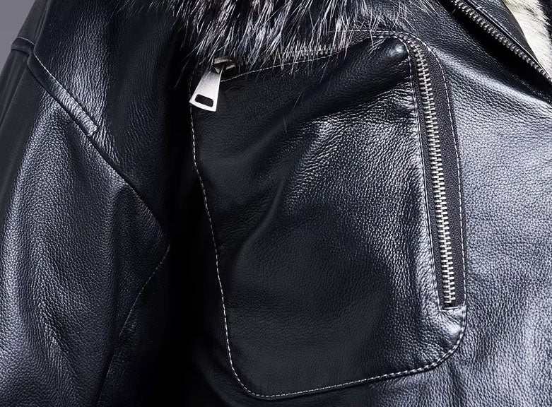Close-up of extended zippered chest pocket on the right side, showing matte hardware and leather texture. From Borcelleclothes.