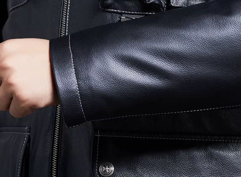 Close-up of sleeve cuff on Onyx jacket highlighting straight stitches and the natural grain of cowhide leather. From Borcelleclothes.