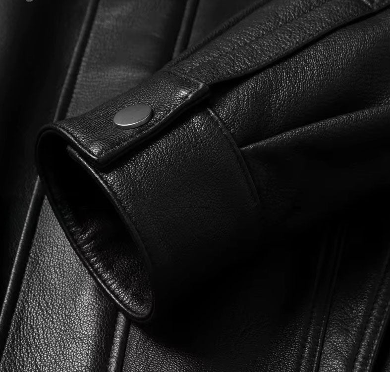 Detail of snap-closure sleeve end on the Onyx goatskin jacket; cleanly secured with minimal visual weight. From Borcelleclothes.