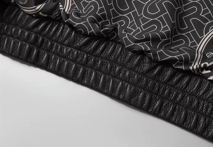 Interior view of the ribbed hem on the Onyx jacket; shows stitching and lining craftsmanship. From Borcelleclothes.