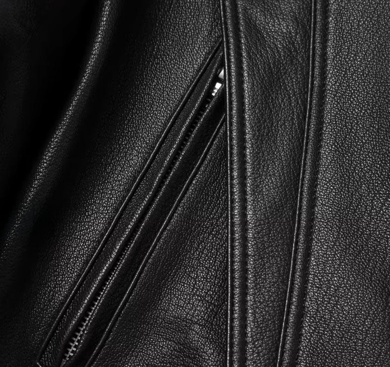 Zippered pocket detail on the Onyx goatskin jacket; highlights smooth line integration and practical access. From Borcelleclothes.