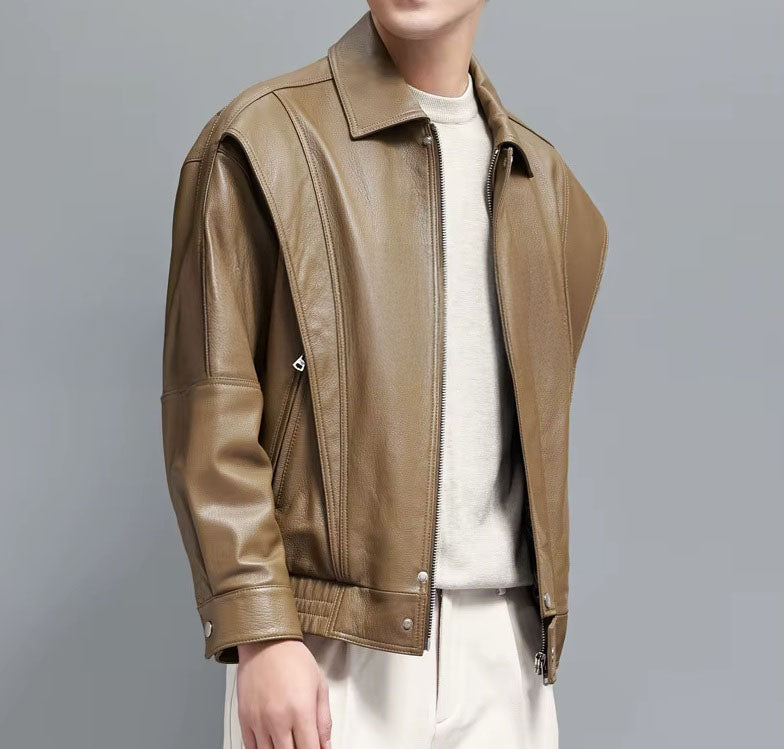 Side view of the Sandrift jacket with model slightly turned; showcases the way flaps curve with movement. From Borcelleclothes.