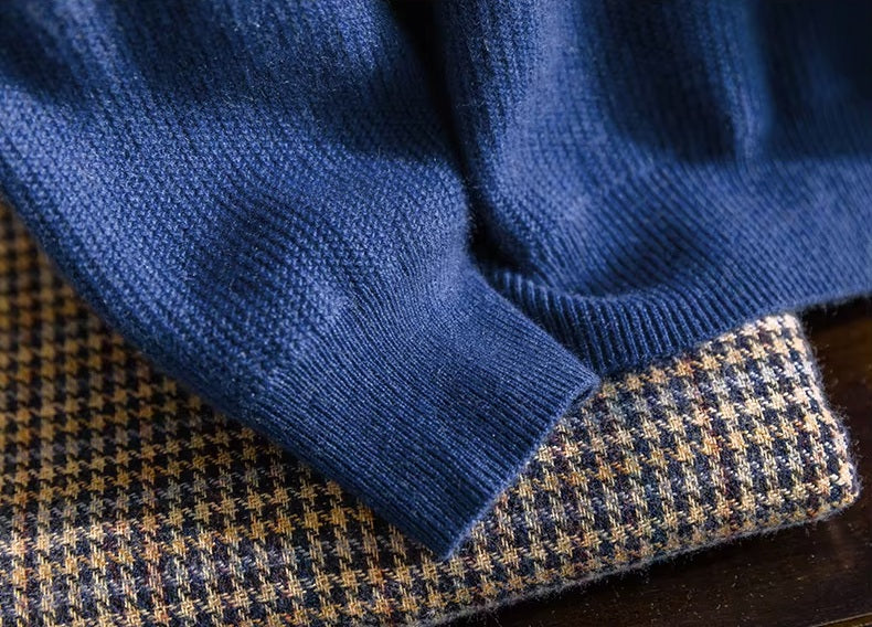 The ribbed sleeve hem on the Men's Grade A Alashan Cashmere Turtleneck Sweater in Regal Blue, showcasing its meticulous design. From Borcelleclothes.