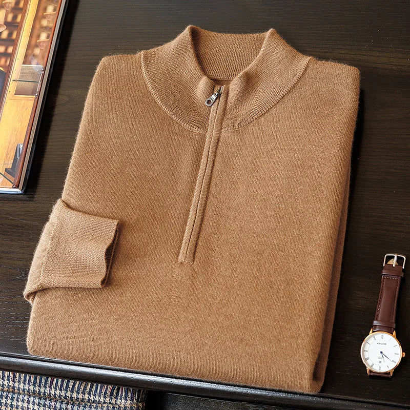 Men's Grade A Cashmere Quarter-Zip Sweater in French Beige, folded neatly with a watch and phone placed alongside, emphasizing its timeless luxury. From Borcelleclothes.