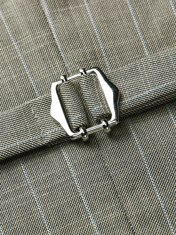 Close-up of the pants with adjustable waist buckle on the grey olive pinstripe suit. From Borcelleclothes.