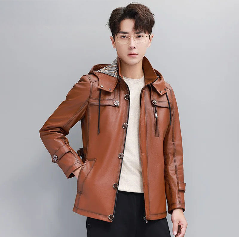 Men’s hooded cowhide leather jacket in Nutmeg — model with hand in waist pocket; zip-through stand collar and flap details visible. From Borcelleclothes.