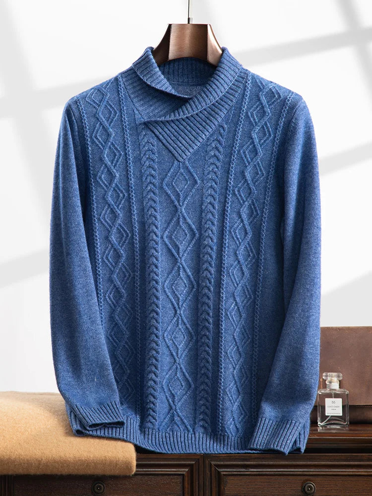 Men's hybrid neck cashmere sweater in Blue Spell, featuring a V-neck shawl collar in 2×2 rib, cable and geometric front panel, and slim-fitting silhouette in stockinette stitch — From Borcelleclothes.