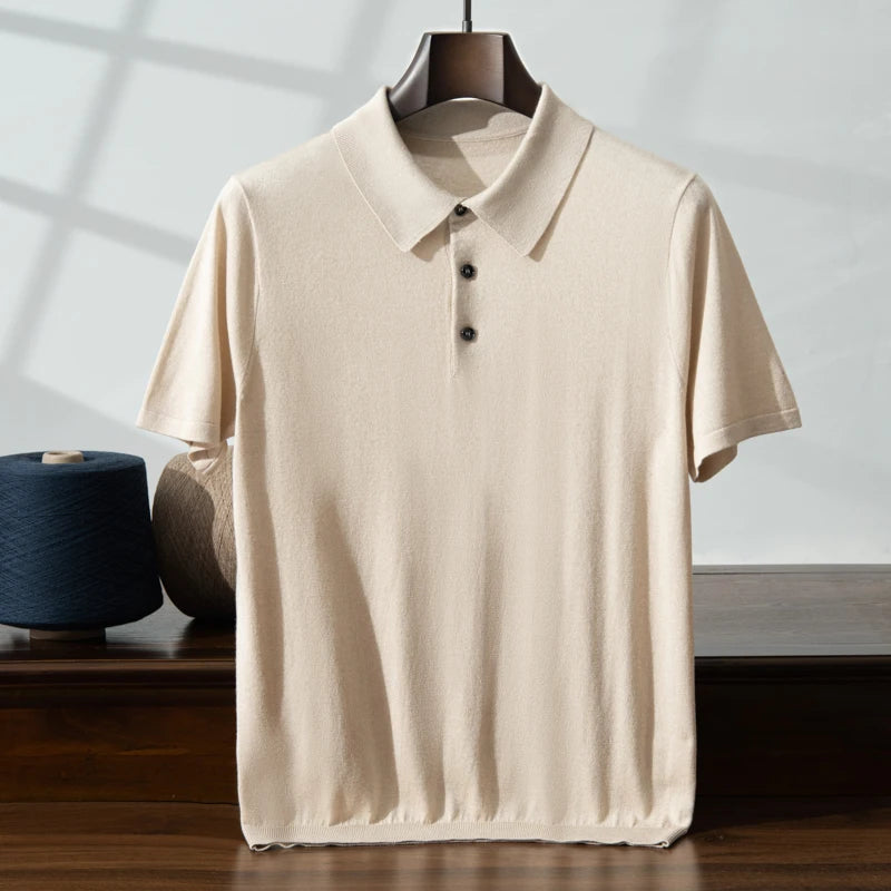 Almond-colored knitted silk-cashmere polo — displayed on a hanger, its weightless drape and supple texture visible. From Borcelleclothes.