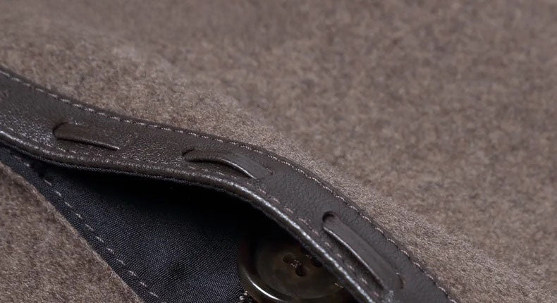 Men’s leather cord weaving wool coat in Falcon, button detail under concealed placket. From Borcelleclothes.