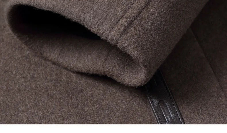 Men’s leather cord weaving wool coat in Falcon, close-up of sleeve cuff. From Borcelleclothes.