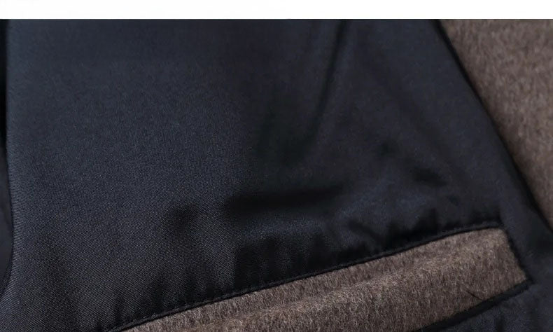 Men’s leather cord weaving wool coat in Falcon, close-up of lining and facing at bottom. From Borcelleclothes.