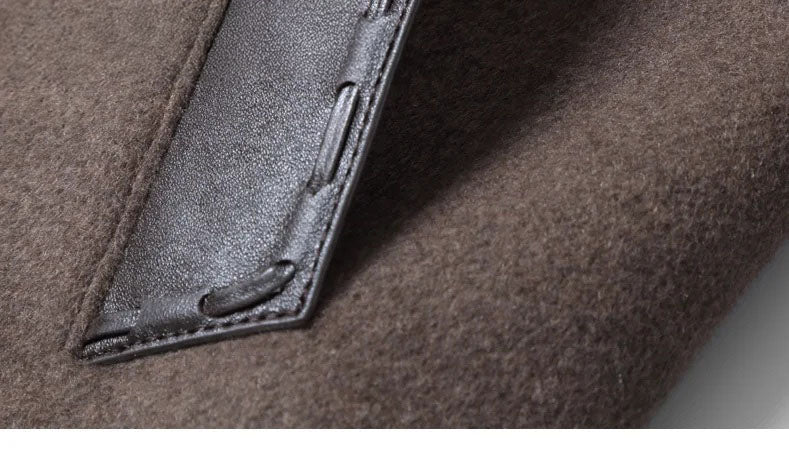 Men’s leather cord weaving wool coat in Falcon, close-up of front leather single-welt pocket lower section. From Borcelleclothes.