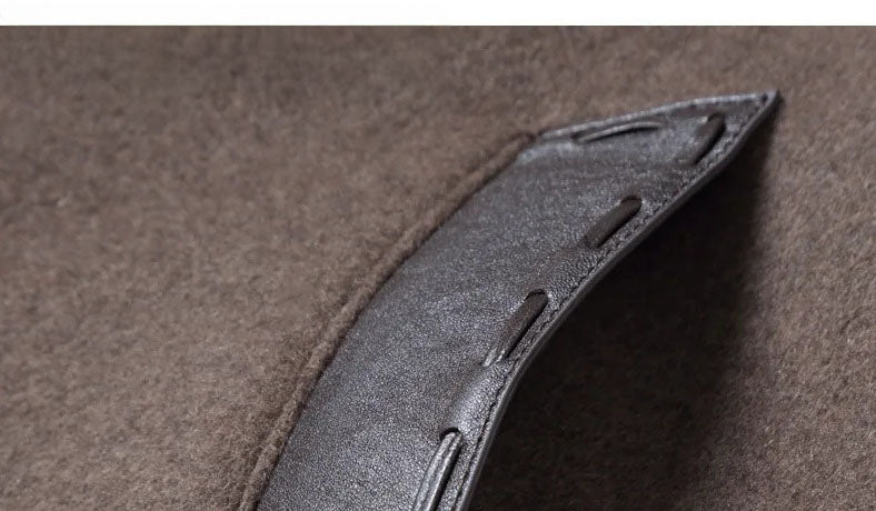 Men’s leather cord weaving wool coat in Falcon, close-up of front leather single-welt pocket upper section. From Borcelleclothes.