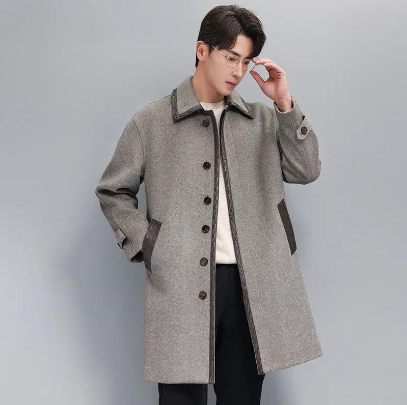 Men’s leather cord weaving wool coat in Mountain Mist, model adjusting glasses. From Borcelleclothes.