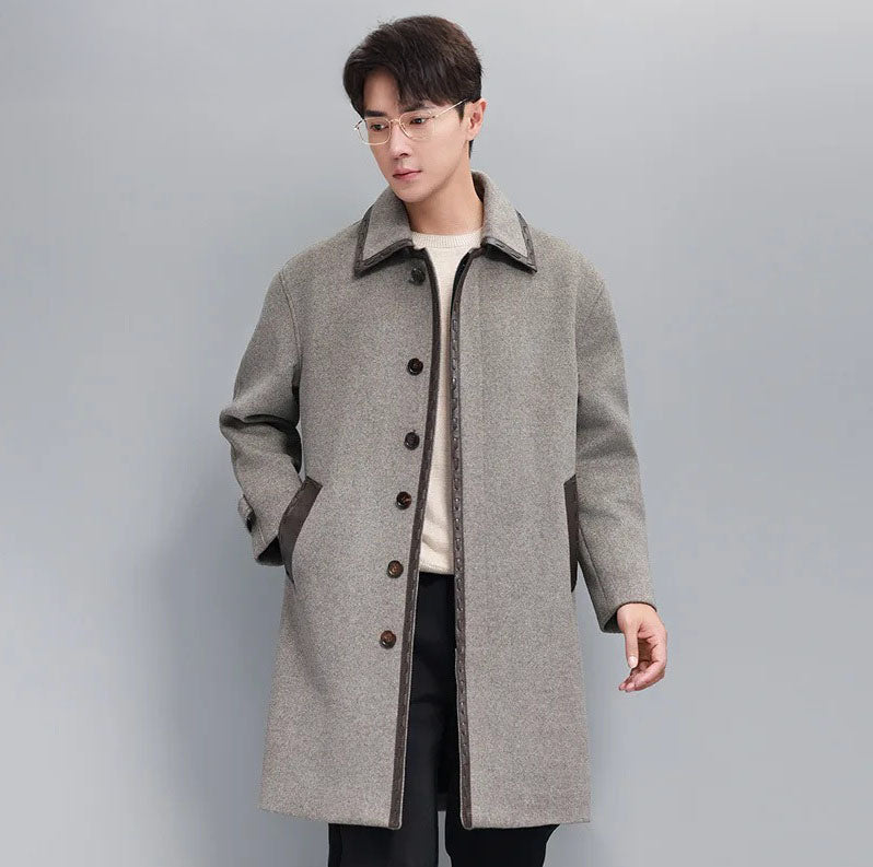 Men’s leather cord weaving wool coat in Mountain Mist, model with one hand in pocket. From Borcelleclothes.