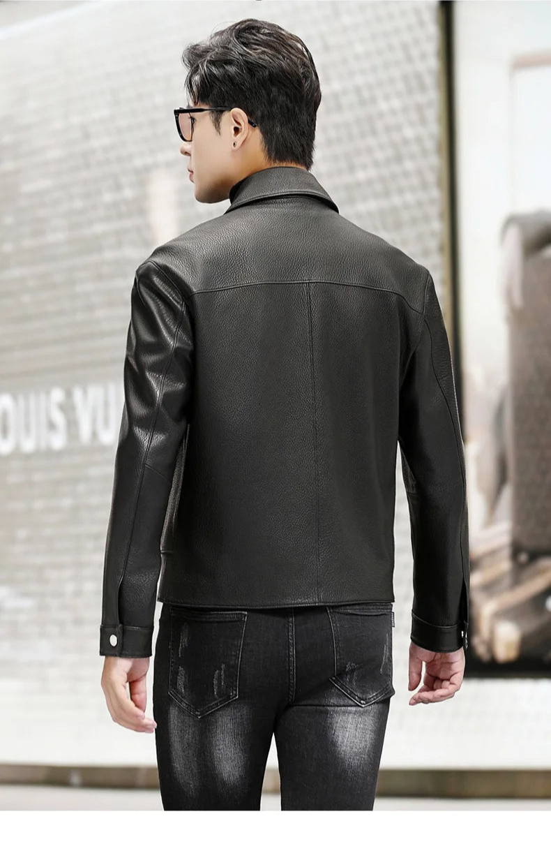 Back view of the black goatskin leather jacket with Carmine Pink zipper accents, worn by the model — From Borcelleclothes.
