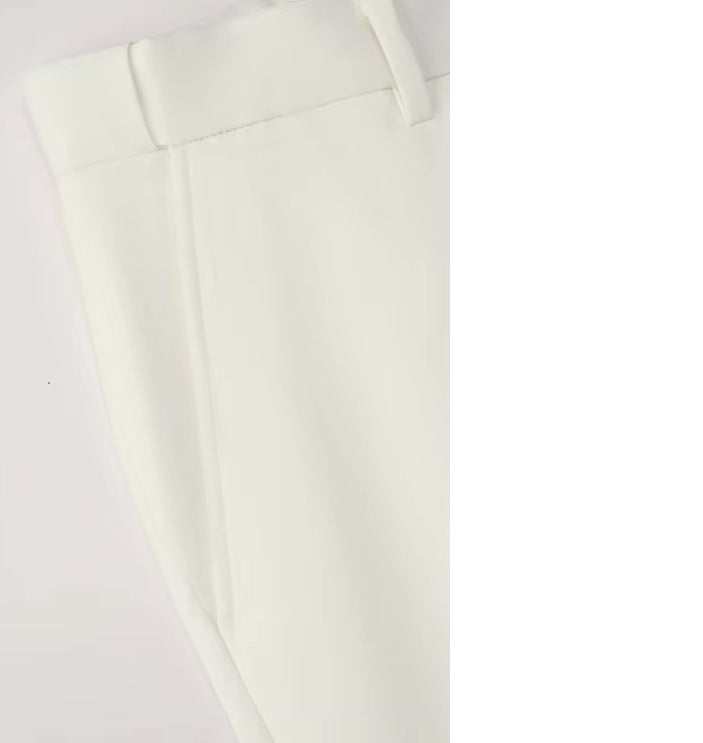 The Men's Luxury Alabaster Suit's pants slash pocket, blending functionality with elegance. From Borcelleclothes.