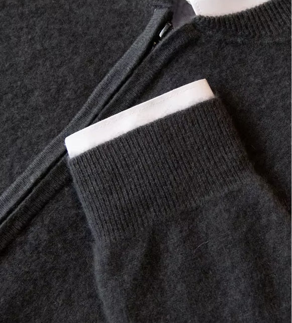 The ribbed sleeve hem on the Men's Luxury Albas Cashmere Cardigan in Dune, showcasing its tailored and polished finish. From Borcelleclothes.