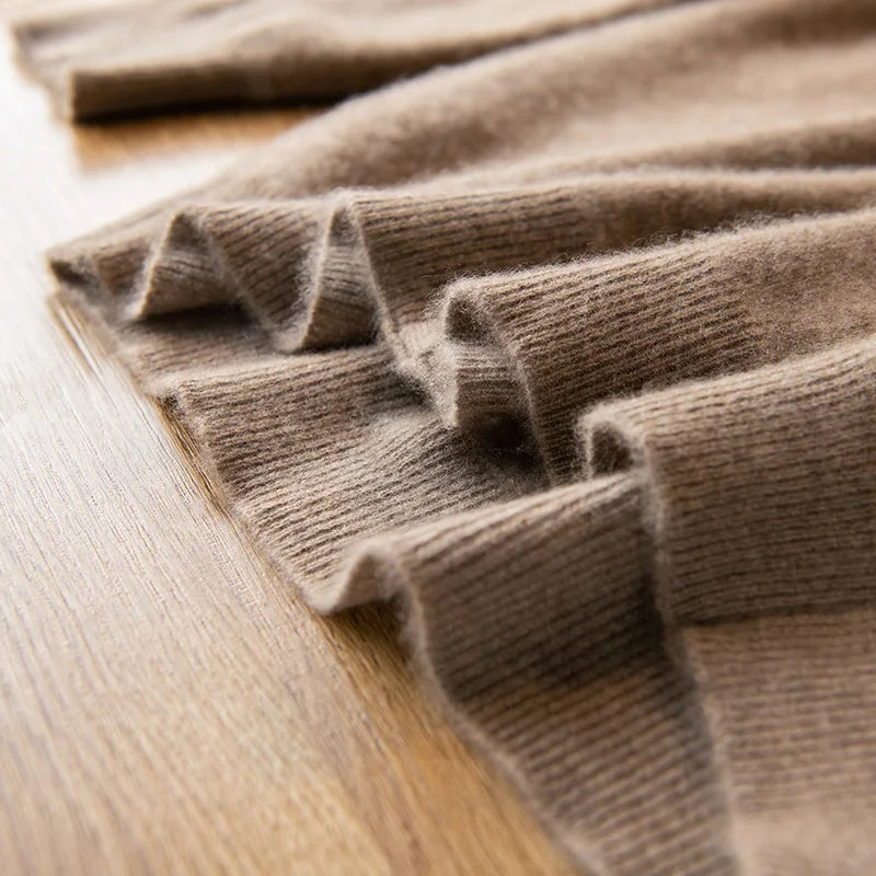 The ribbed bottom hem on the Men's Luxury Albas Cashmere Cardigan in Roman Coffee, providing structure and a refined touch. From Borcelleclothes.