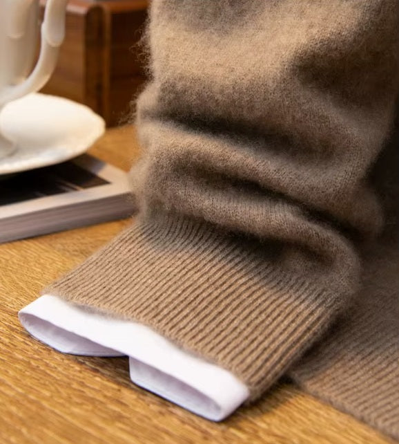 The ribbed sleeve hem on the Men's Luxury Albas Cashmere Cardigan in Roman Coffee, highlighting its polished and tailored finish. From Borcelleclothes.