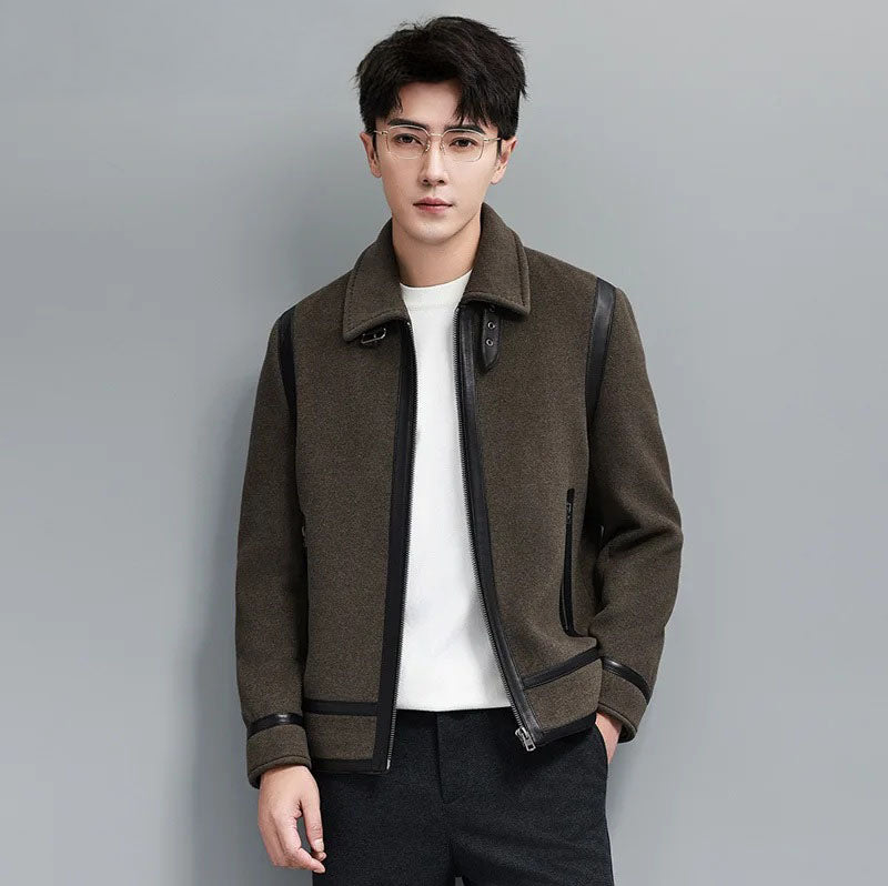 Model in Makara luxury wool-cashmere bomber with sheepskin leather trim, hand in pants pocket, from Borcelleclothes.