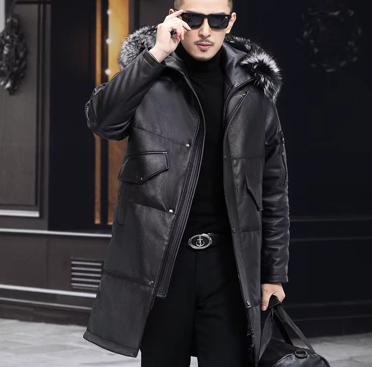 Model in Onyx jacket adjusting glasses, with relaxed expression and architectural collar. From Borcelleclothes.