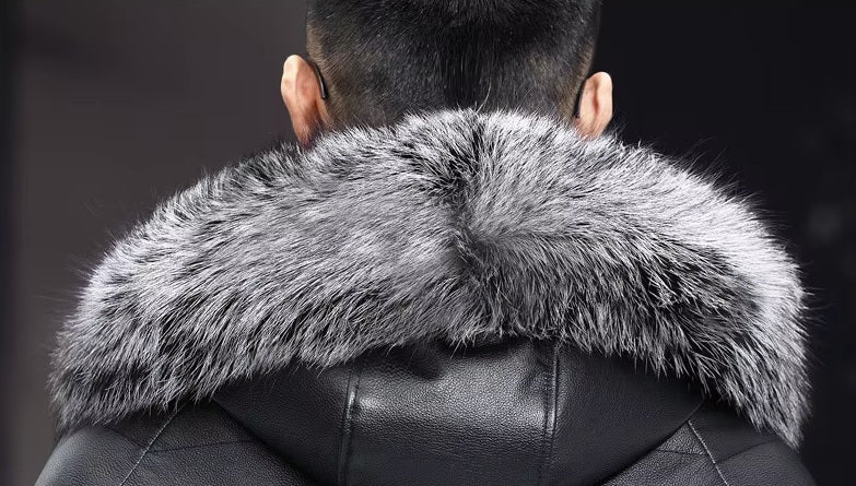 Back view of model in Onyx jacket, showing structured hood with fox-style fur trim. From Borcelleclothes.