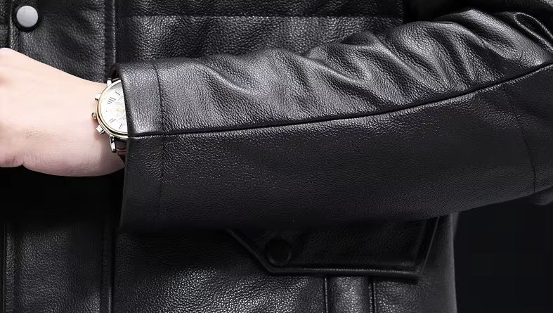 Close-up of cuff section in Onyx jacket, with visible watch.  From Borcelleclothes.