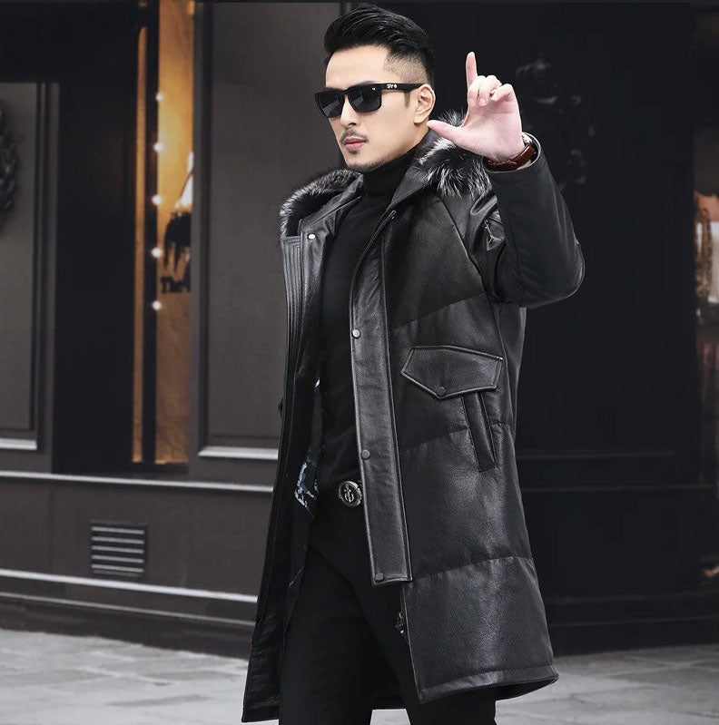 Model raises arm slightly in Onyx jacket, revealing relaxed raglan sleeve and shoulder seam. From Borcelleclothes.