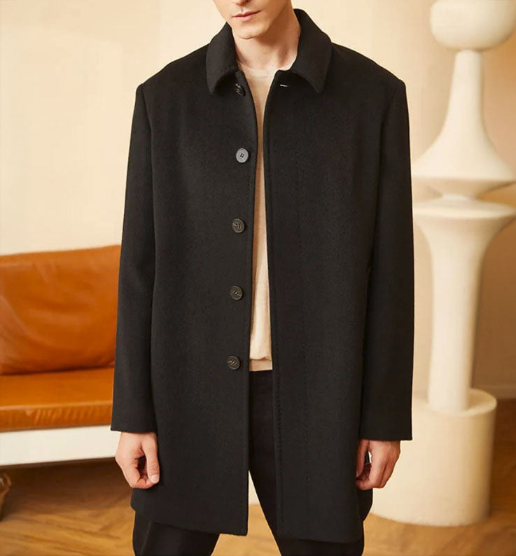 Men’s Minimalist Cashmere Coat in Zeus, crafted from a premium blend of 70% cashmere and 30% high-count wool. Featuring a sleek single-breasted design, structured set-in sleeves, and a refined visible upper button for a modern, minimalist aesthetic. From Borcelleclothes.
