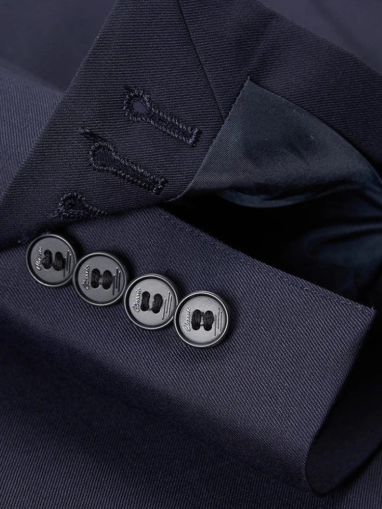 The unfastened decorative sleeve placket on the blazer of the Borcelleclothes Men's Modern Gentleman’s Ebony Clay Suit, highlighting the four-button detail.