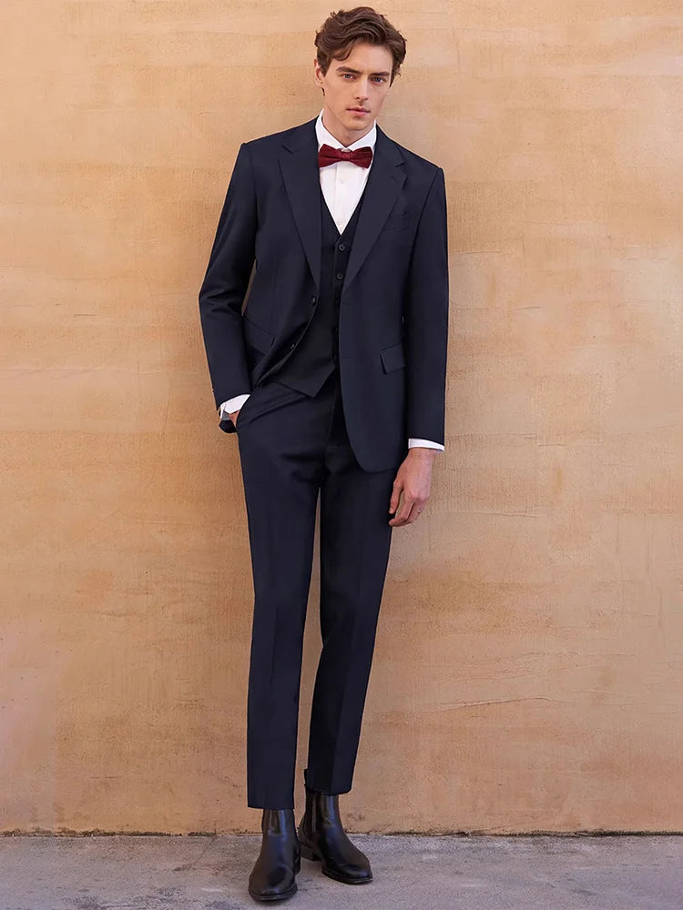 Model in the Borcelleclothes Men's Modern Gentleman’s Ebony Clay Suit with one hand in the pants pocket, showcasing the sleek and tailored design.