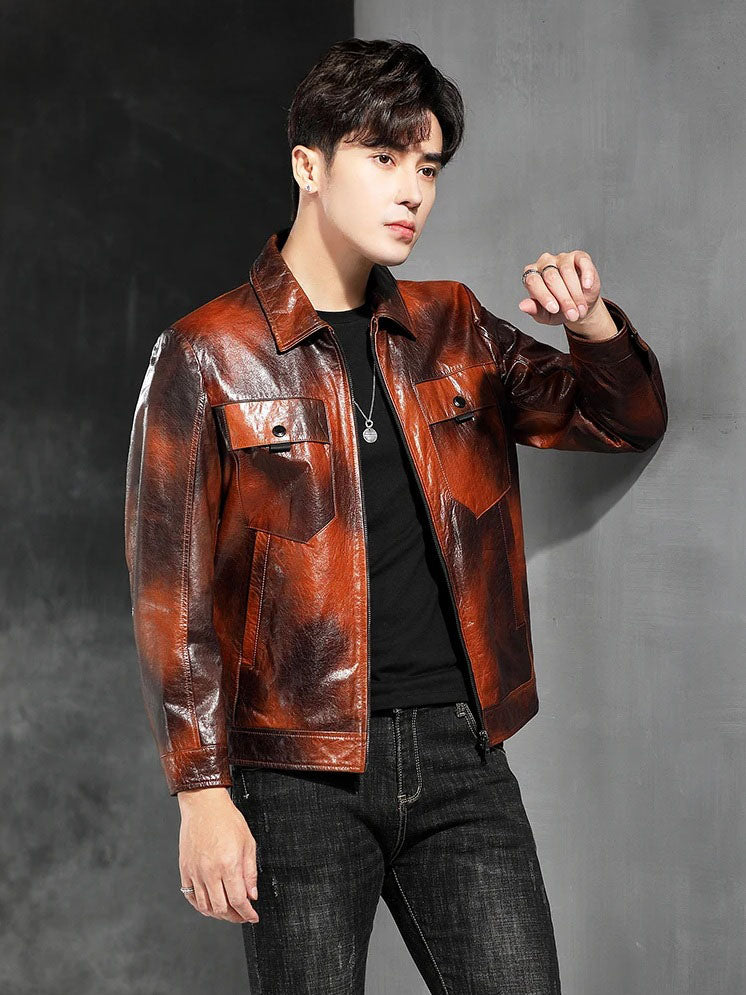 Mottled Cowhide Leather Jacket — model leaning with elbow on wall; pointed collar and hem band. From Borcelleclothes.