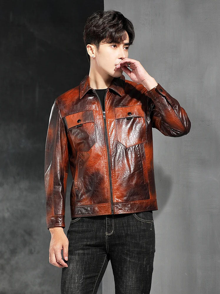 Mottled Cowhide Leather Jacket — model touching lips; calm mottled grain in Cognac or Eclipse. From Borcelleclothes.
